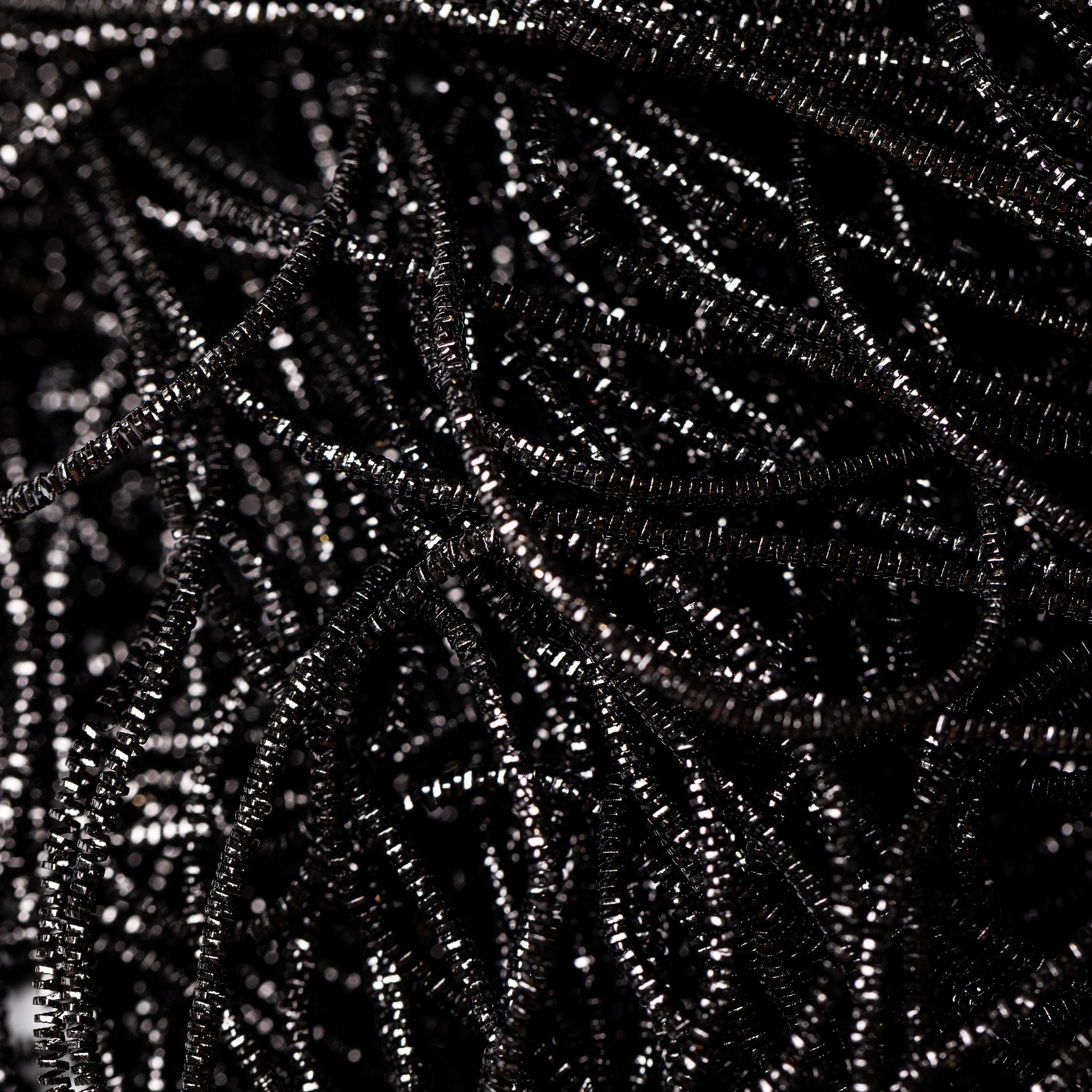 Black Shimmer Goldwork Embroidery Bullion Close Up