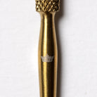 Gold embroidery pricker with crown detail
