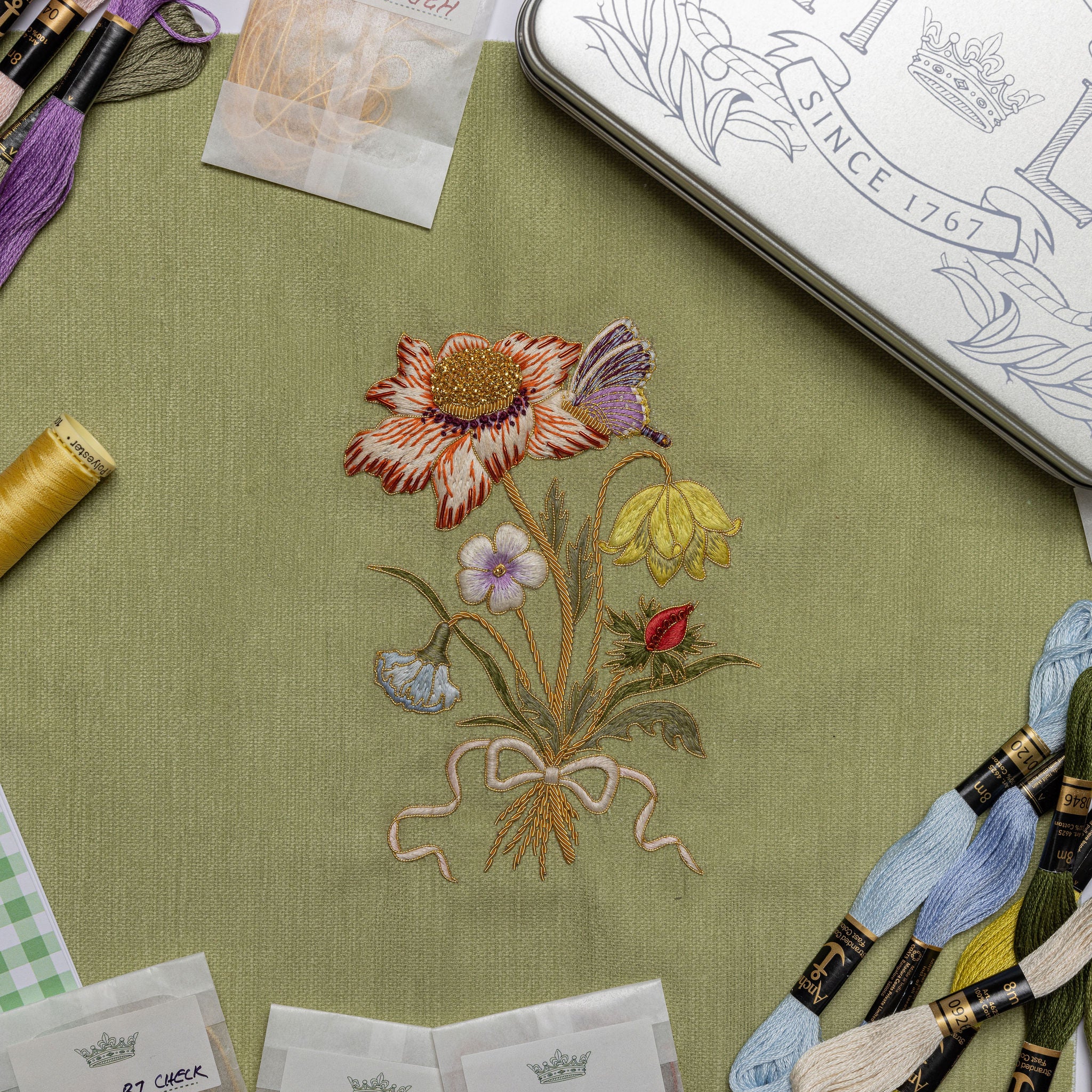 The Wild Bouquet Kit - Embroidered flowers on green fabric