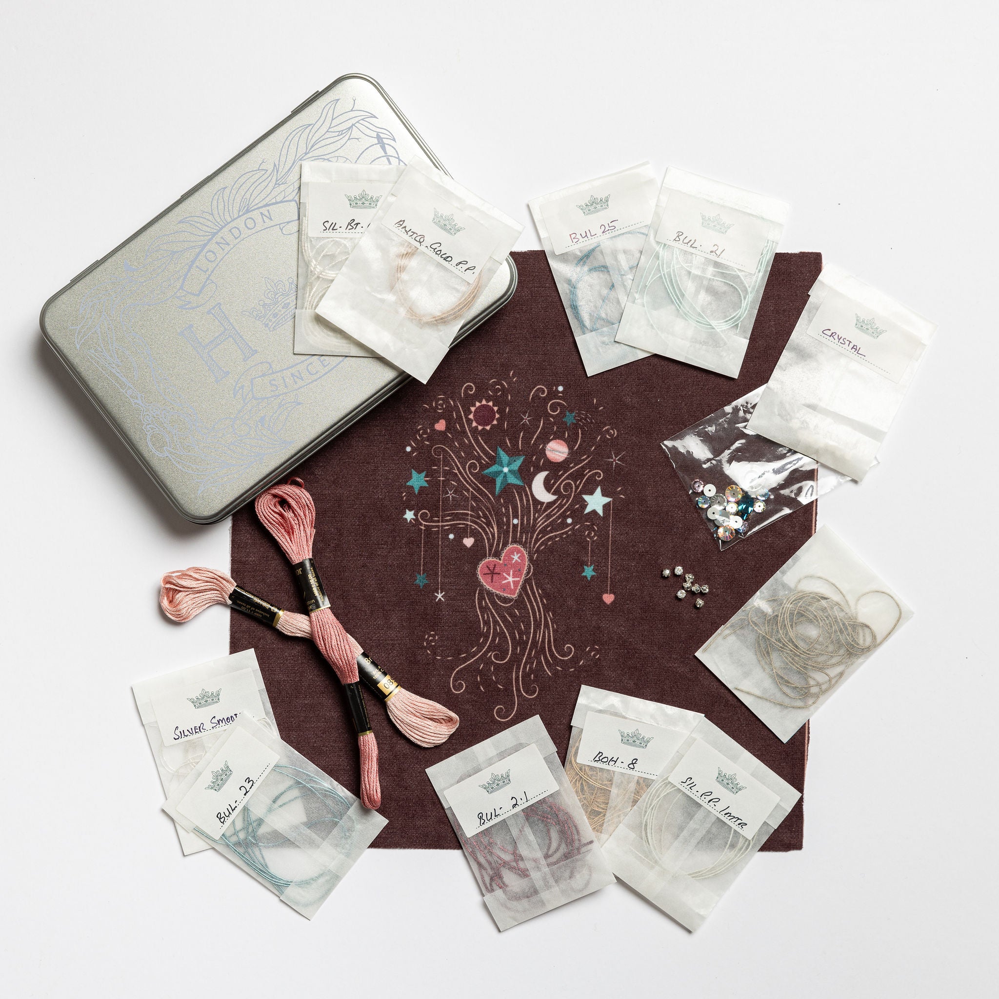 The Wishing Tree Goldwork Embroidery Kit layout with materials , tin and digital print fabric base