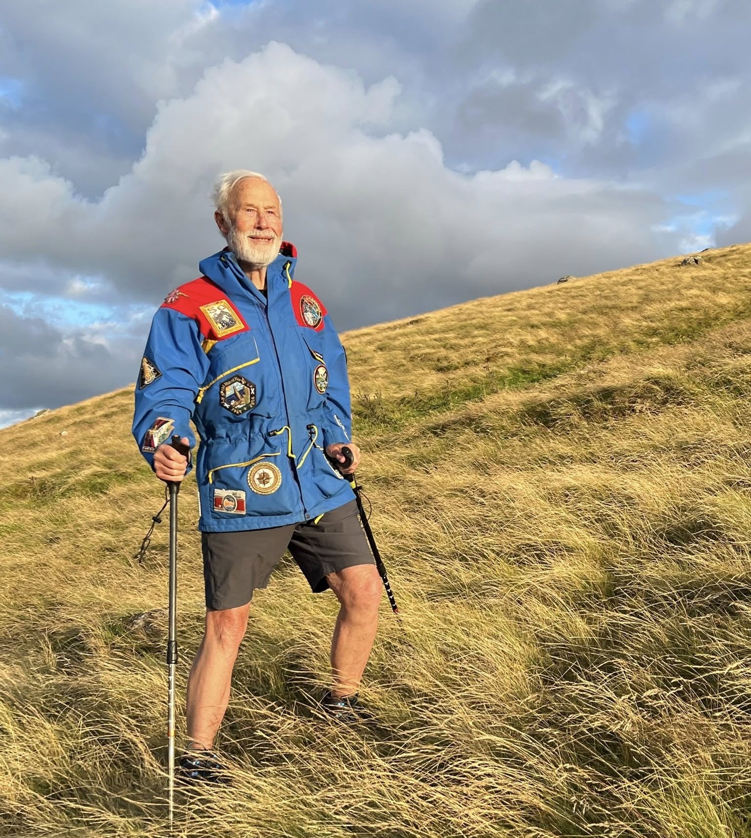 Sir Chris Bonington wearing his customised vintage Berghaus Trango jacket  with embroidered badges by Hand & Lock