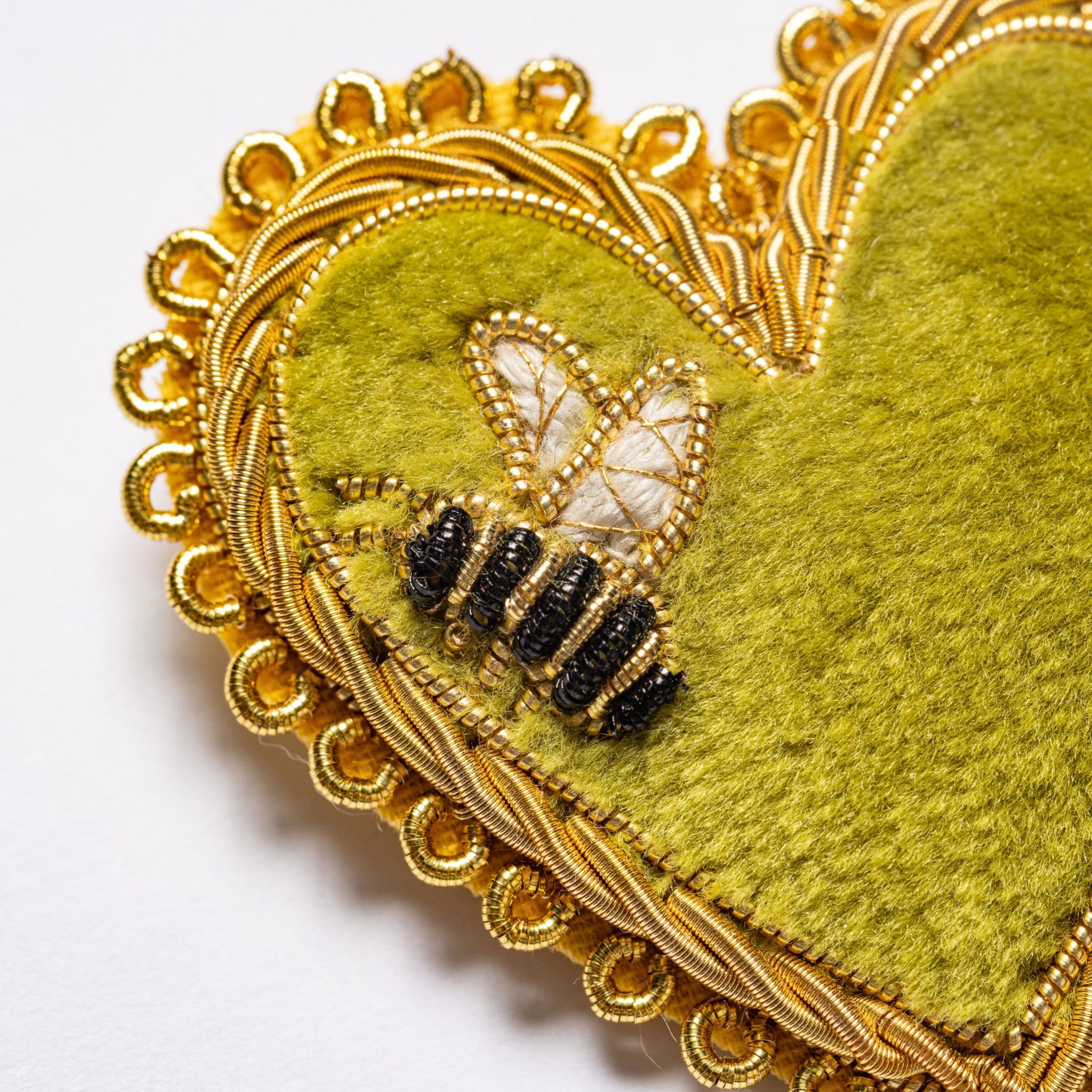 Bee Heart Brooch - Hand Embroidered brooch, close up of the goldwork bee design 