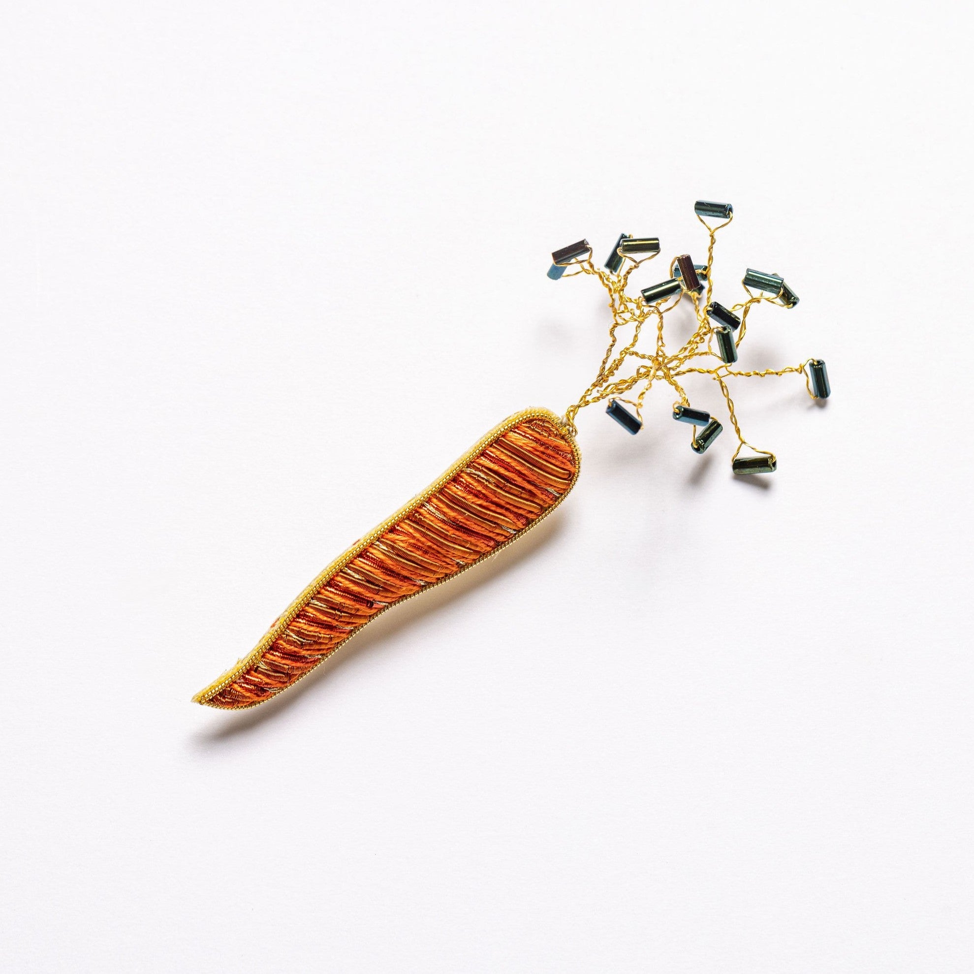 Carrot Brooch - Hand Embroidered brooch on a white background