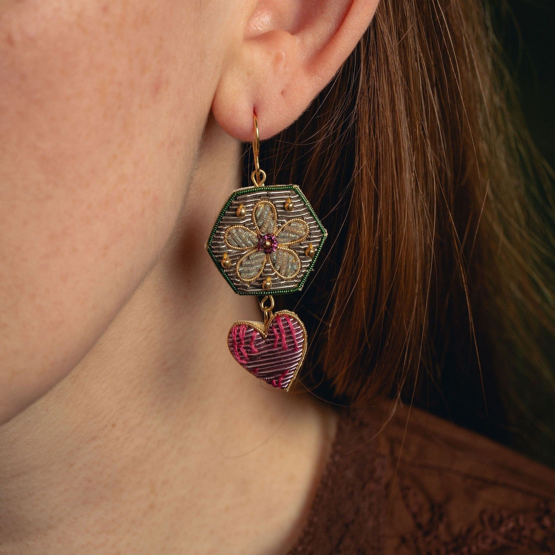 Garden Charm Earrings - Hand Embroidered floral and heart earrings shown being worn