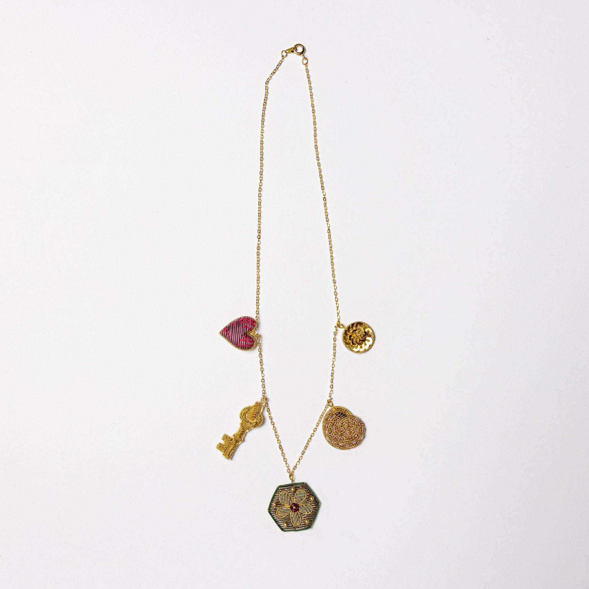 Garden Charm Necklace - Hand Embroidered charm necklace on a white background