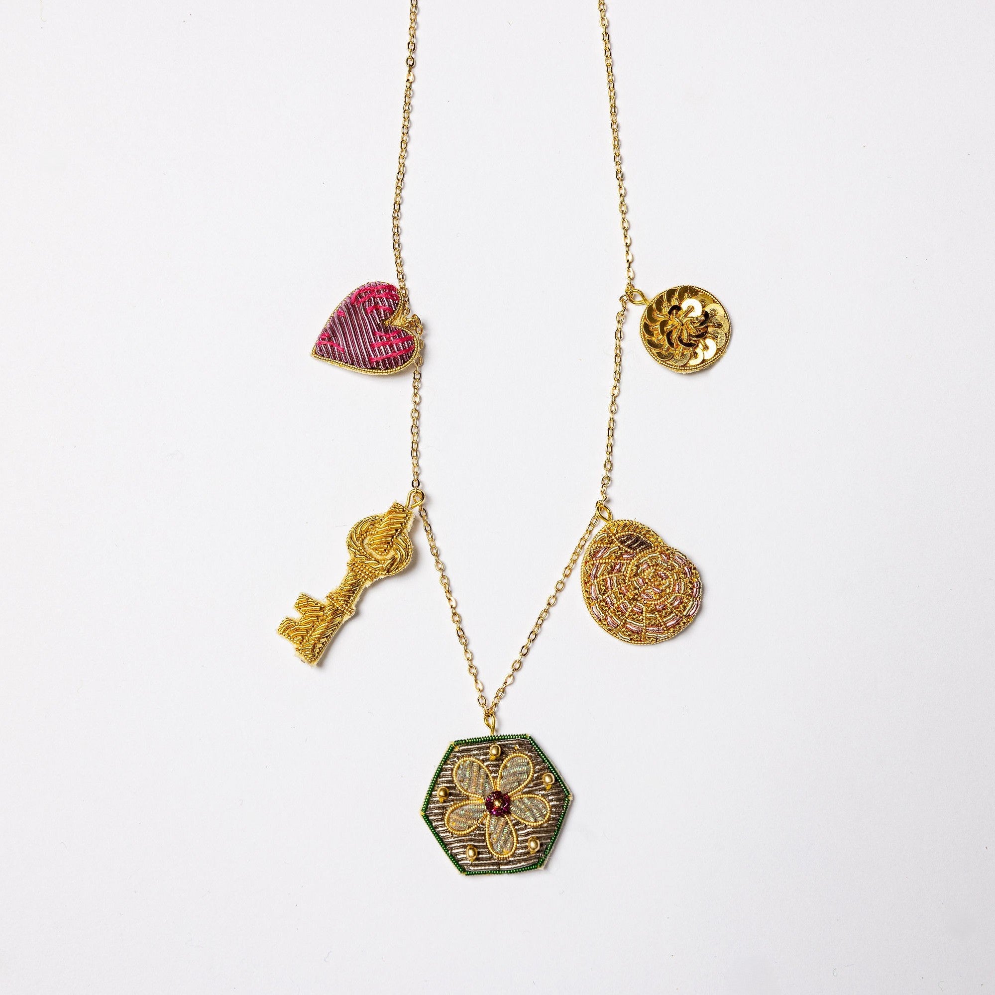 Garden Charm Necklace - Hand Embroidered charm necklace on a white background