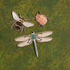 Garden Insects Embroidered Patch Set - Embroidered patches of a bee, dragonfly, and beetle on a green background