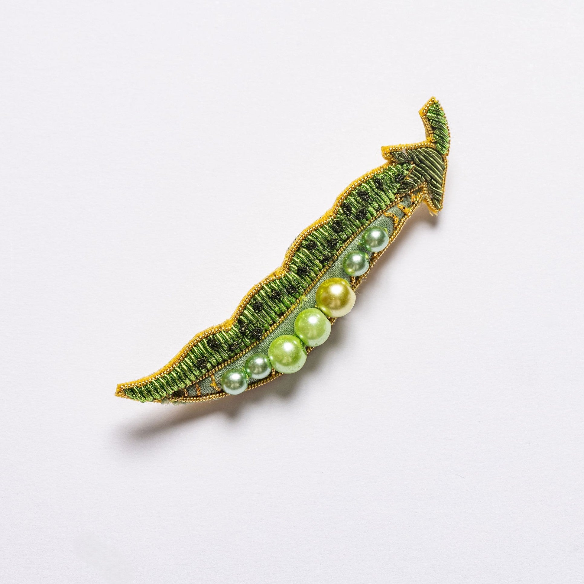 Green Pea Brooch - Hand Embroidered brooch on a white background 