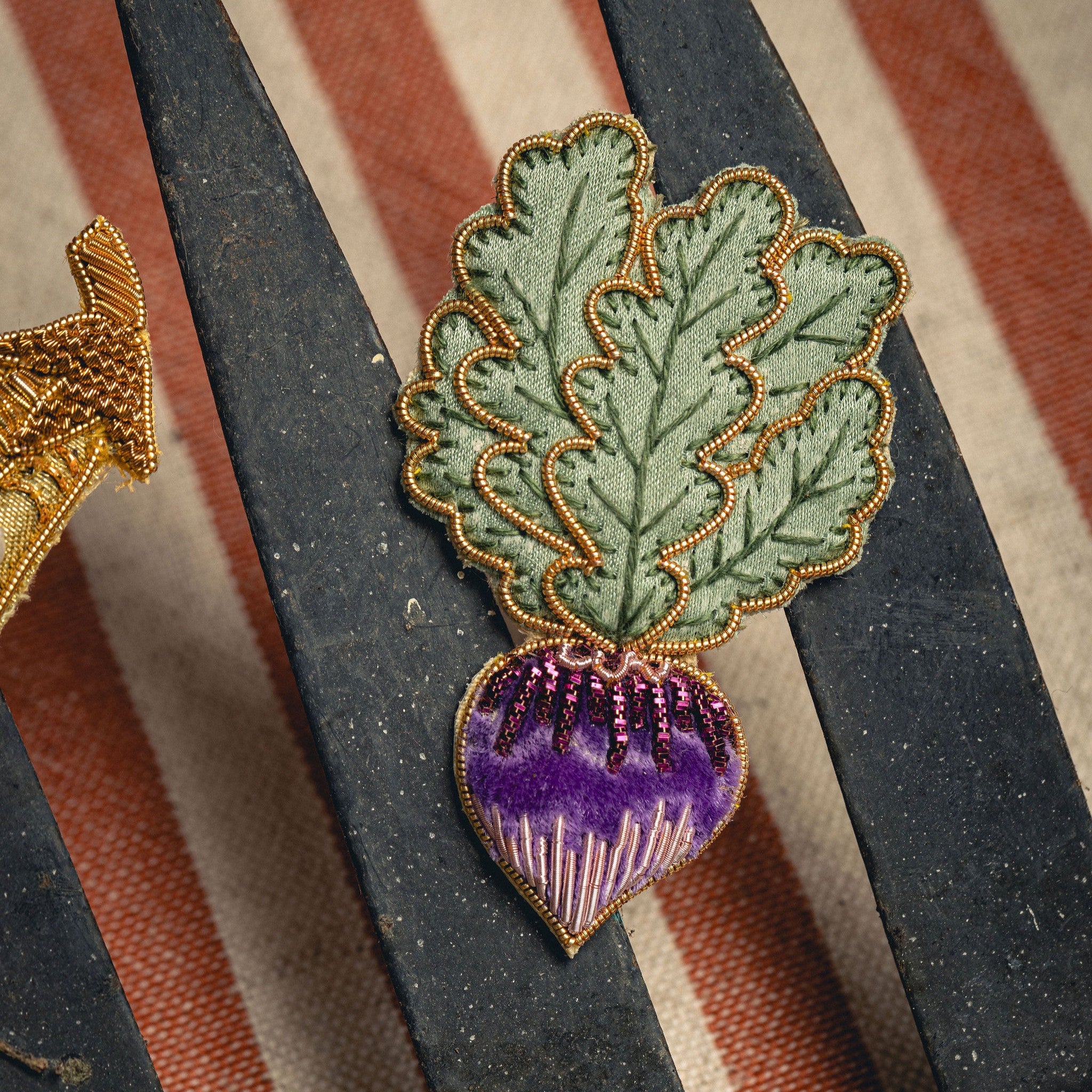 Radish Brooch - Photographed on a gardening hand fork