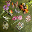 How Does our Garden Grow Collection - Collection of embroidered patches on a green background