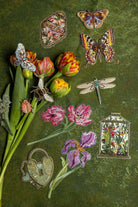 How Does our Garden Grow Collection - Collection of embroidered patches on a bouquet of tulips on a green background