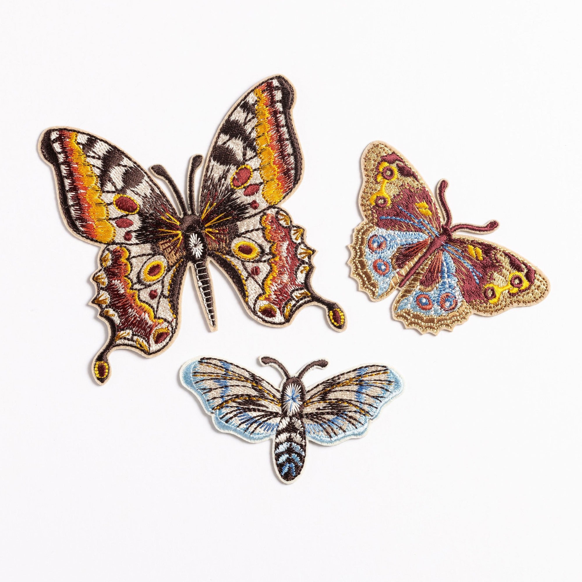 Kaleidoscope Butterflies Embroidered Patch Set - Three colorful butterfly patches on a white background
