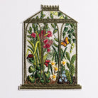Locks Greenhouse Embroidered Patch - Embroidered artwork of a botanical greenhouse with flowers and plants inside.