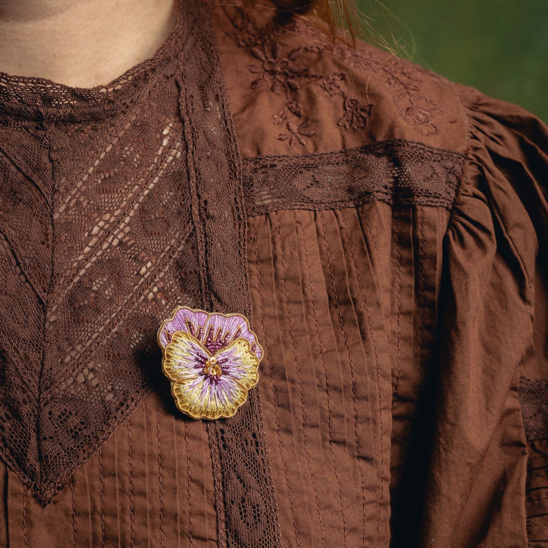 Pansy Brooch - Hand Embroidered flower brooch on a brown blouse