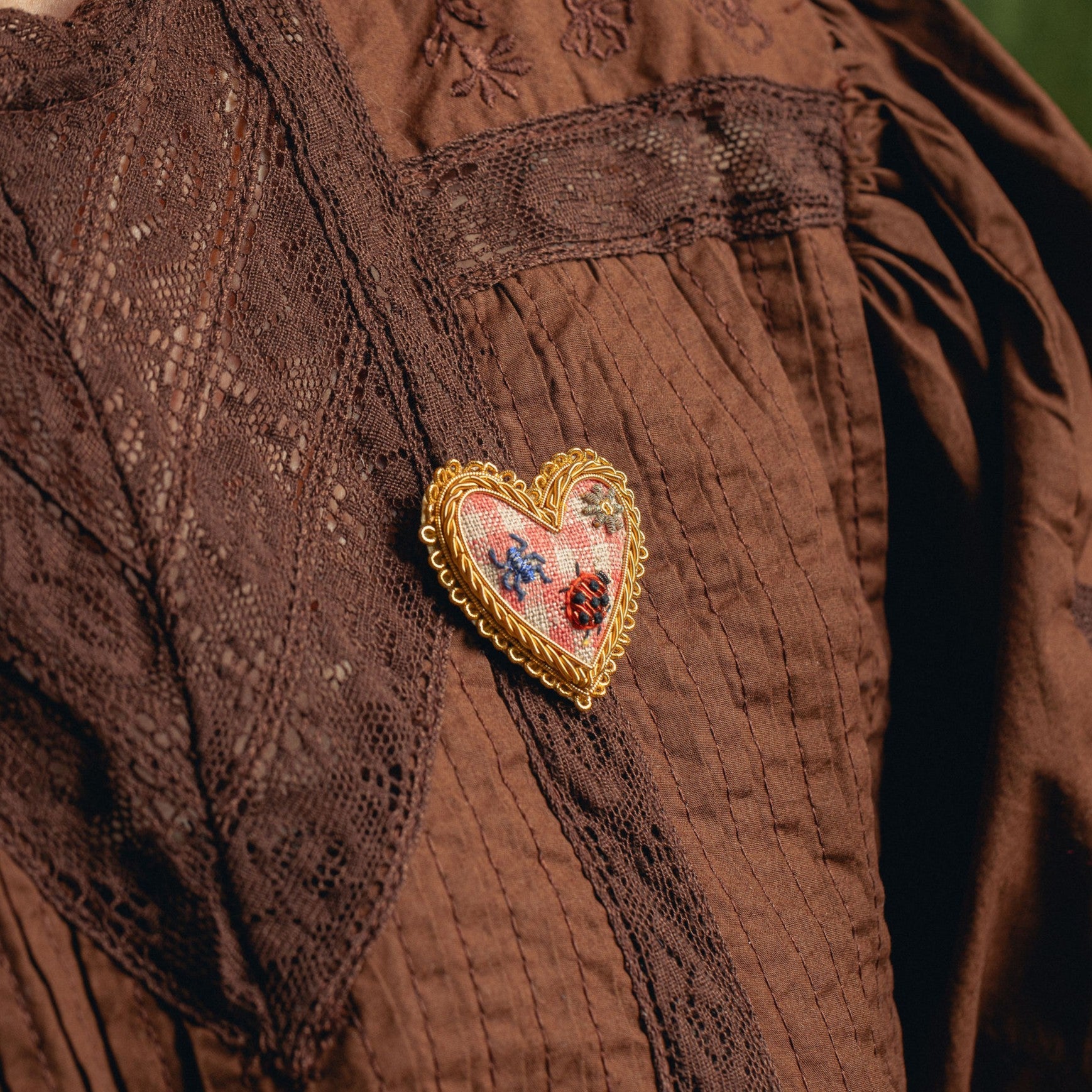 Picnic Heart Brooch - Hand Embroidered heart brooch on a brown blouse