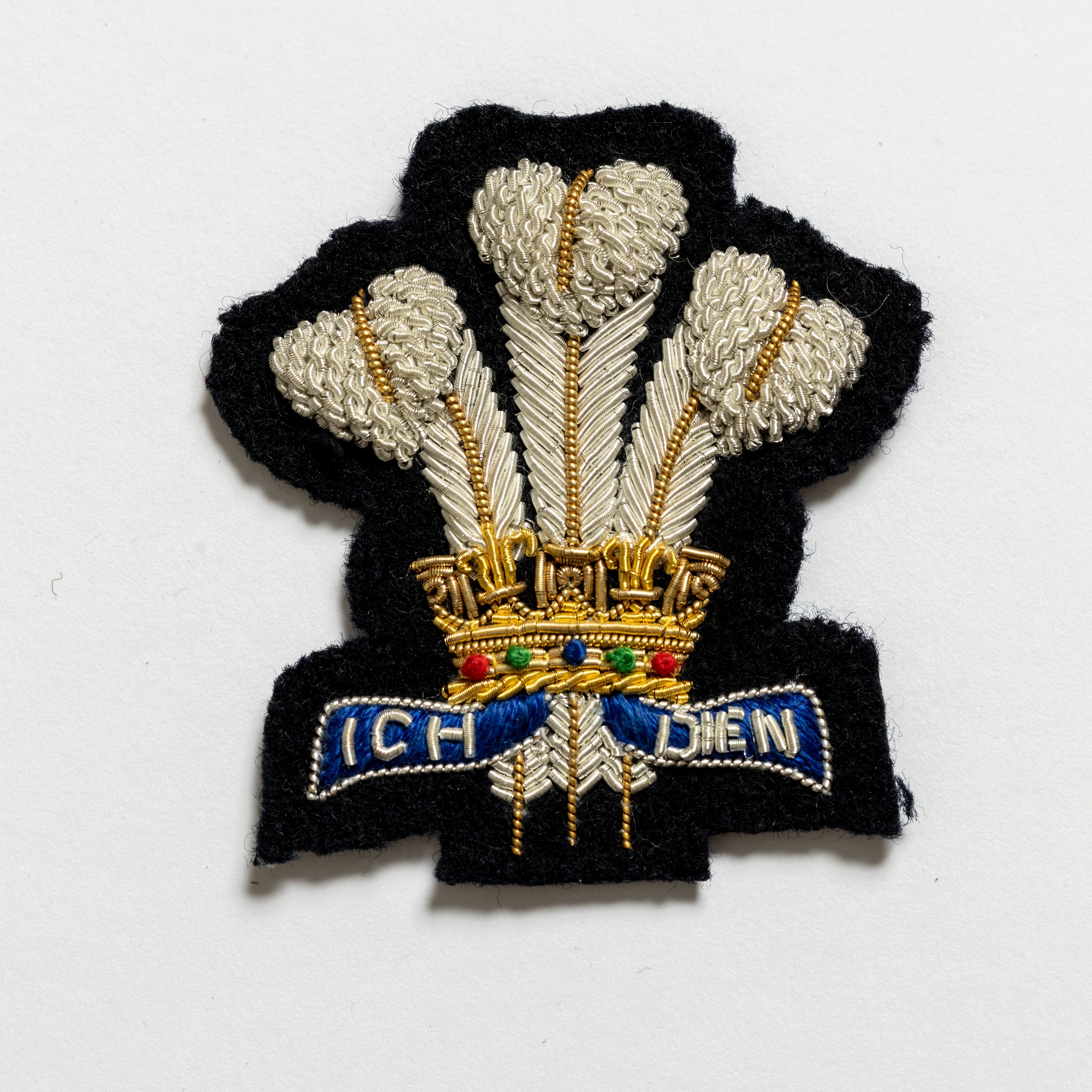 ROYAL REGIMENT OF WALES CAP BADGE-ON DARK NAVY (4334335754312)