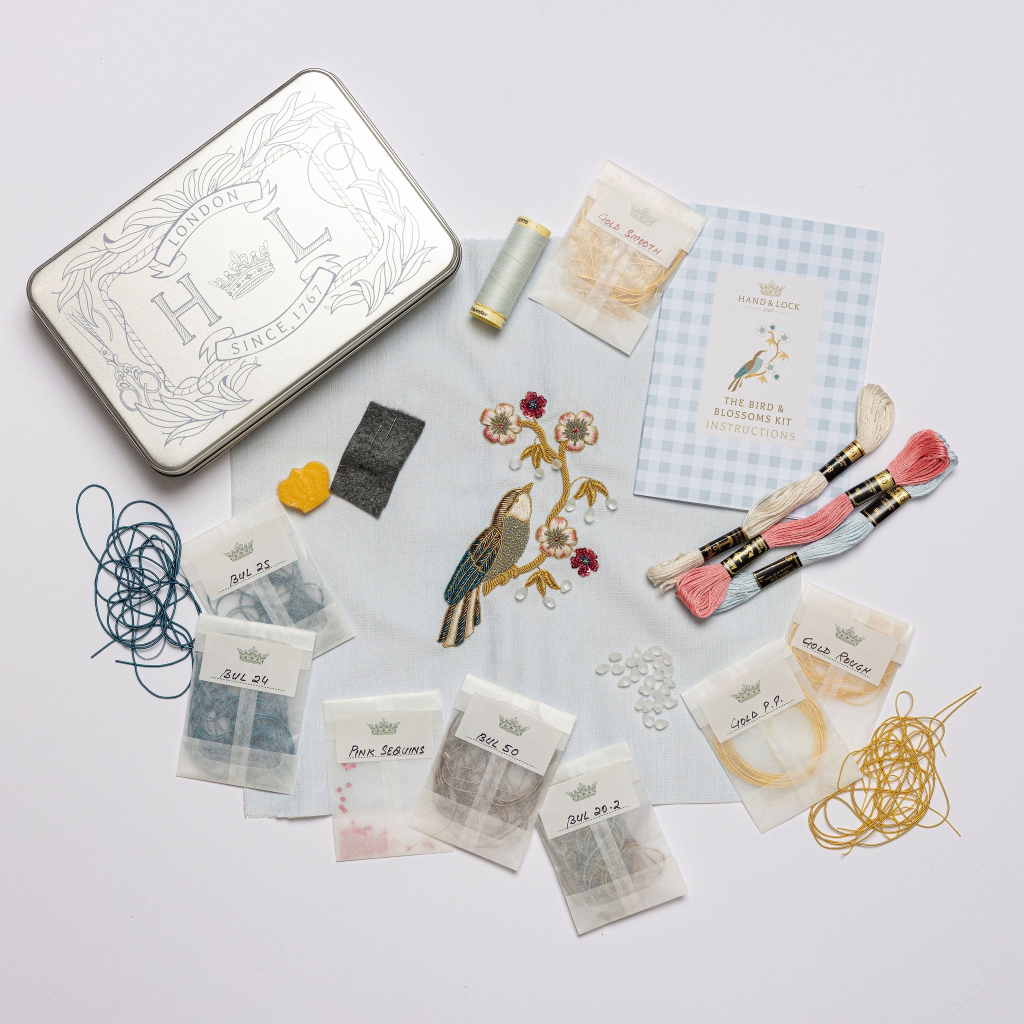 The Bird & Blossoms Kit - Bird and flower embroidery kit with kit materials displayed
