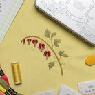 The Bleeding Heart Kit - Embroidered fabric with Bleeding Hearts Flowers on a yellow background
