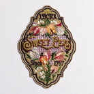 Sweet Pea Seeds Patch - Decorative patch with floral design and text on a white background