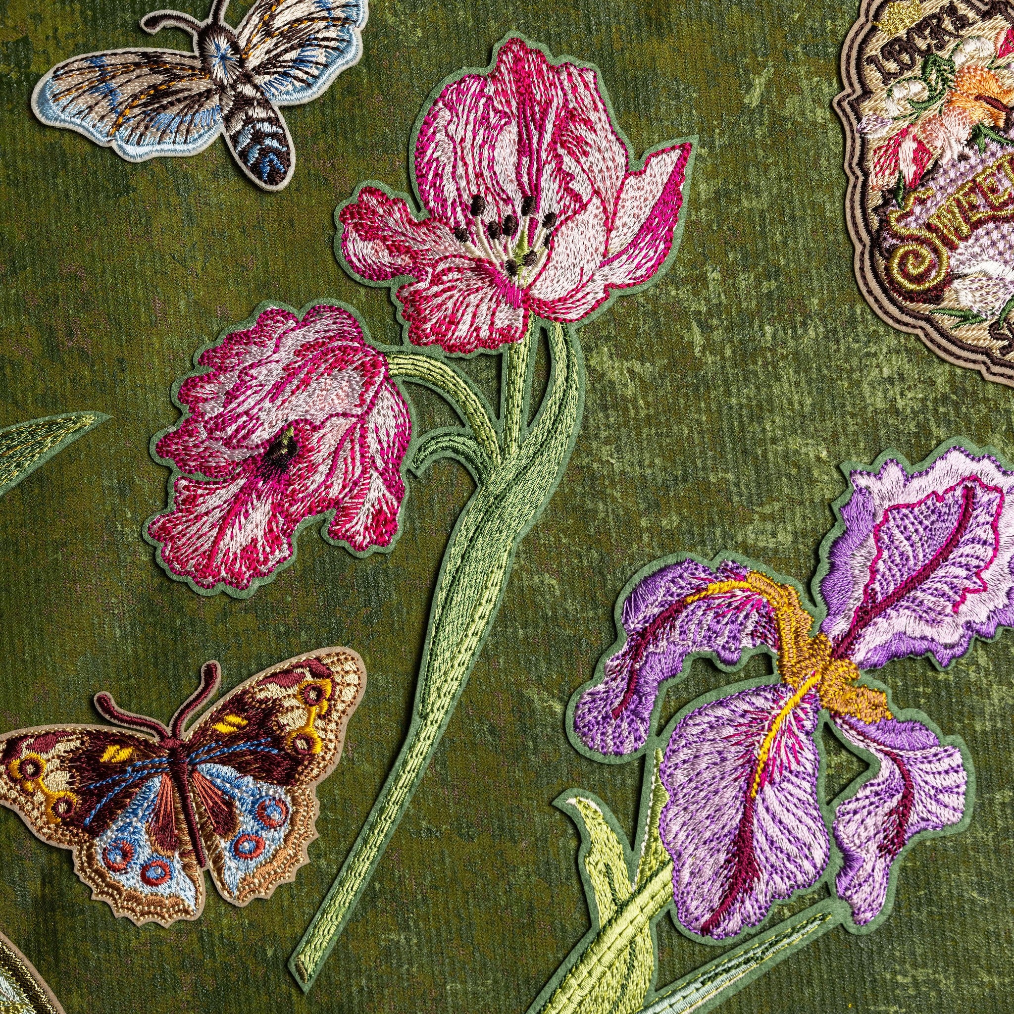Tulip Flower Embroidered Patch - Embroidered patches of flowers and butterflies on a green background