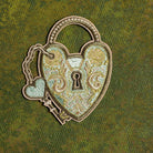 Verdigris Padlock Embroidered Patch - Decorative heart-shaped lock patch with intricate designs on a green background