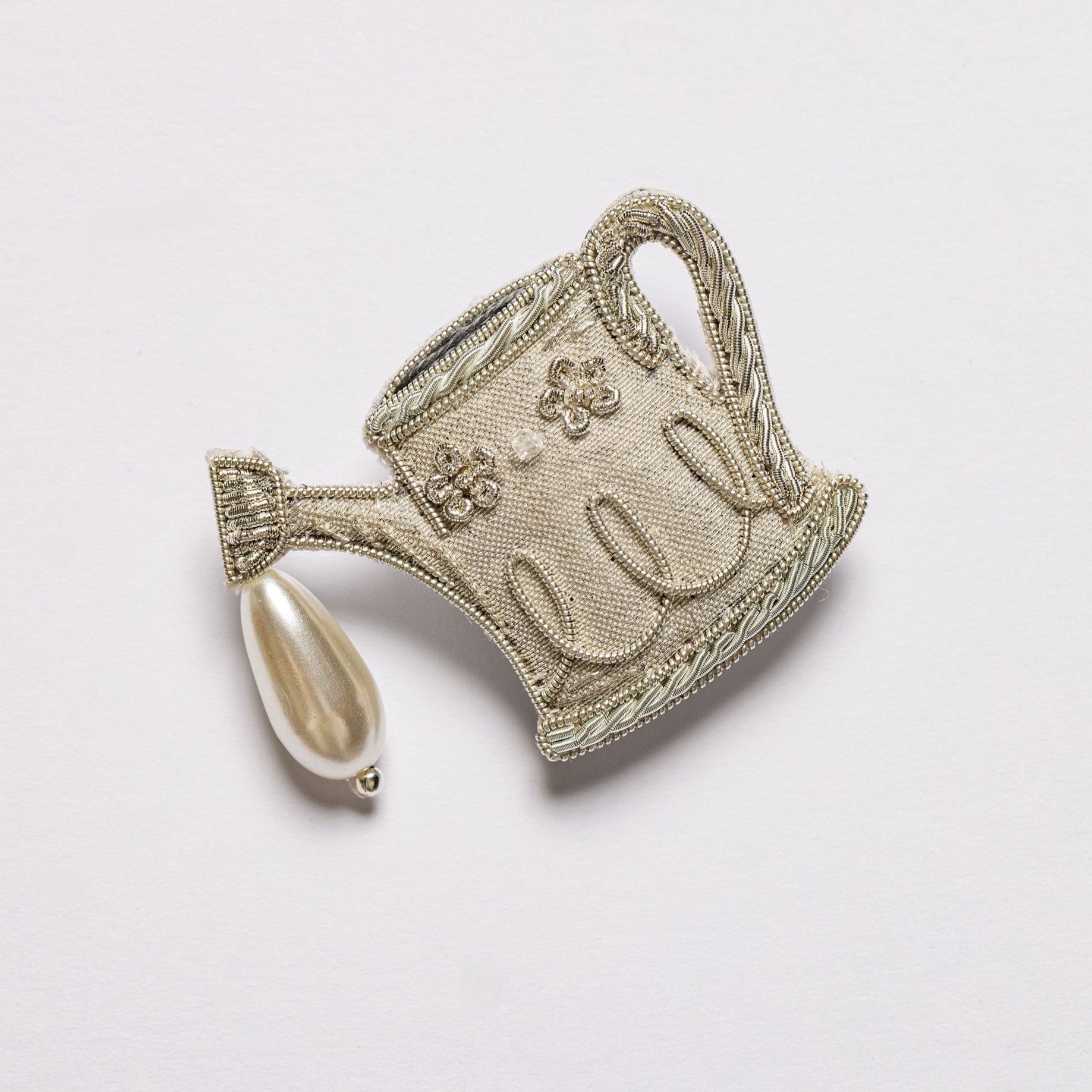Watering Can Brooch - Hand Embroidered brooch on a white background