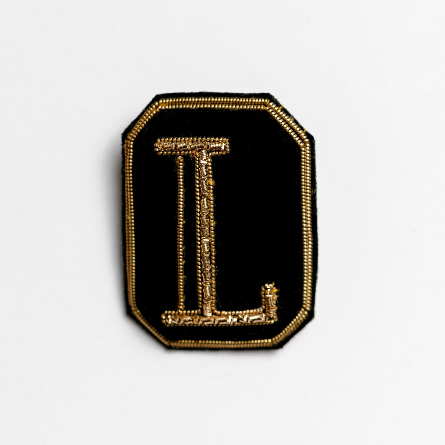 Letter brooch 2025